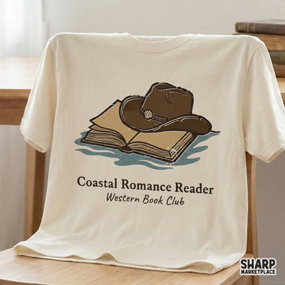 Trendy western beach book club digital design printed on a cream t-shirt, showing a cowboy hat resting on an open book with vintage typography.