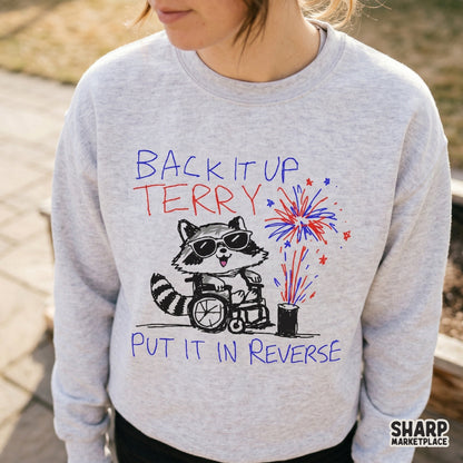 Retro style digital art of a raccoon in a wheelchair with fireworks and the phrase Back It Up Terry Put It In Reverse, perfect for DIY projects.