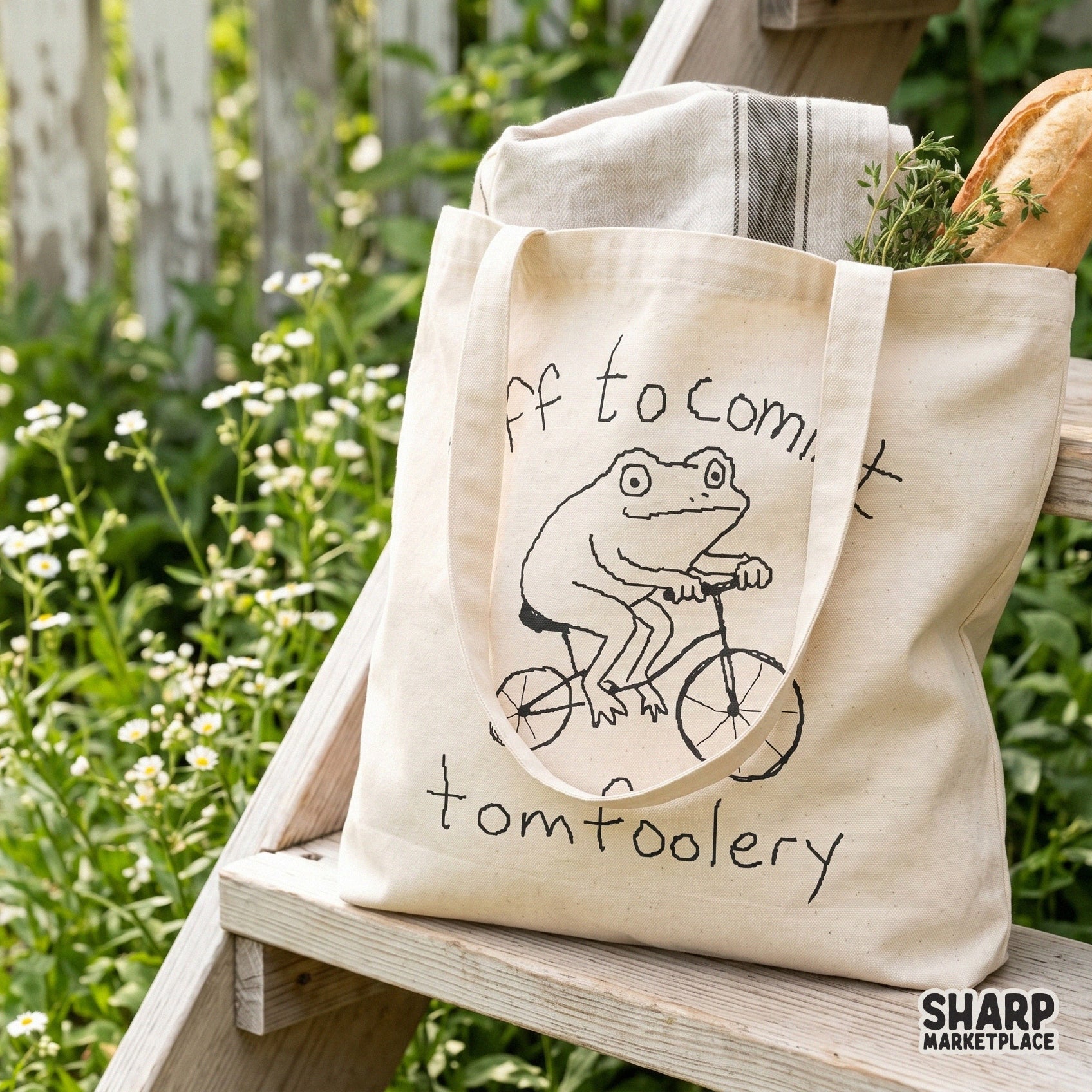 Minimalist black line art of a frog pedaling a bicycle, surrounded by the phrase Off to commit tomfoolery, ideal for DTF and shirt printing.