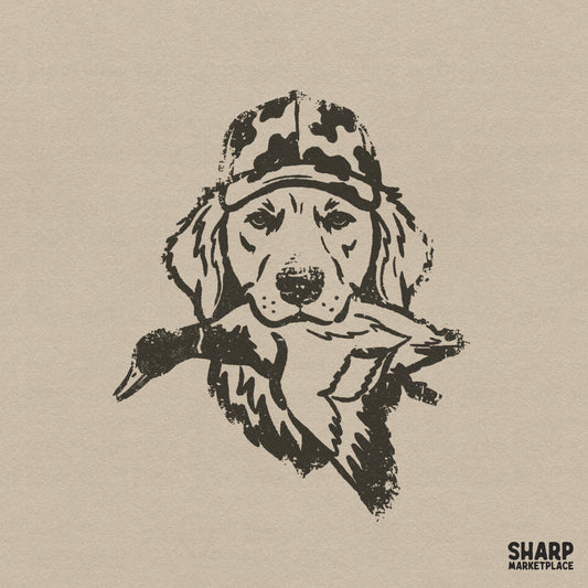 Vintage sketch style digital design of a retriever dog wearing a camo cap and holding a mallard duck, perfect for hunting themed apparel and crafts.