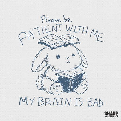 Hand-drawn navy blue ink sketch of a cute bunny reading a book with another book balanced on its head, featuring the text Please be patient with me my brain is