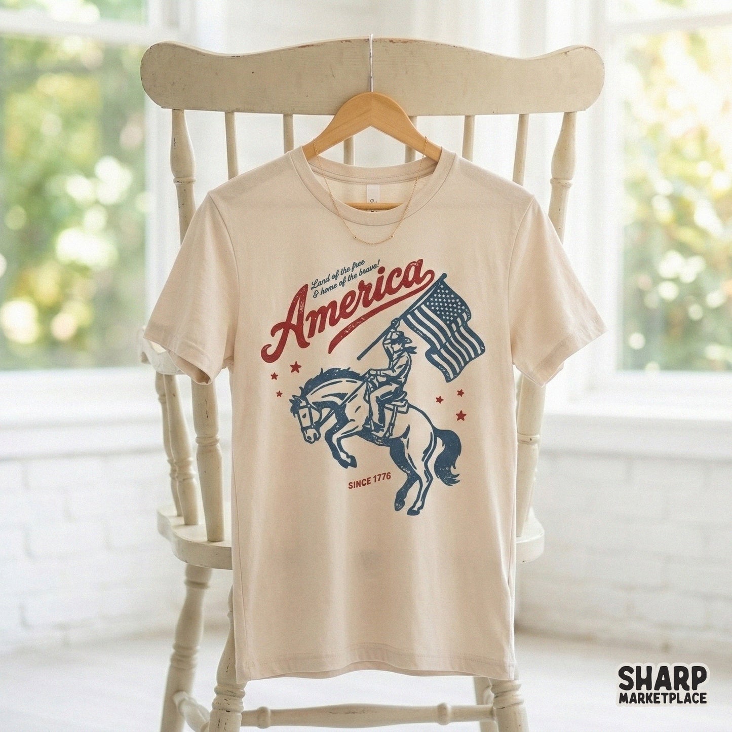 Patriotic digital download with a weathered red and blue aesthetic, featuring a cowboy, bucking horse, and national anthem lyrics for apparel printing.