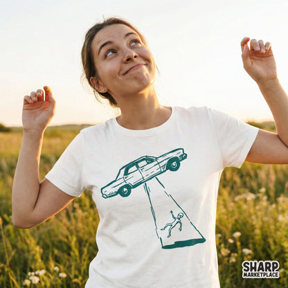 Monochromatic teal illustration of a classic four-door car hovering in a UFO beam with an extraterrestrial figure, ideal for sublimation and stickers.