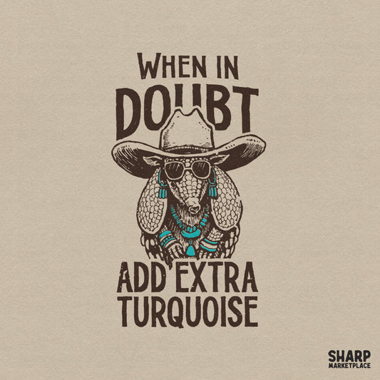 Vintage style armadillo wearing a cowboy hat, sunglasses, and turquoise jewelry with the text When In Doubt Add Extra Turquoise for DIY projects.
