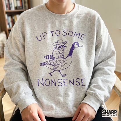 Whimsical western animal design featuring a raccoon rider on a goose with hand-lettered text, ideal for custom stickers, tumblers, and DIY craft projects.