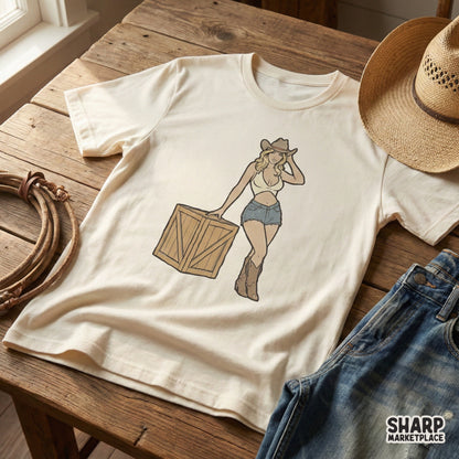 Retro western digital design featuring a blonde cowgirl in denim shorts and cowboy boots leaning against a crate, perfect for sublimation and t-shirts.