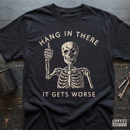 Sarcastic skeleton giving a thumbs up with Hang In There It Gets Worse quote retro dark humor shirt PNG design