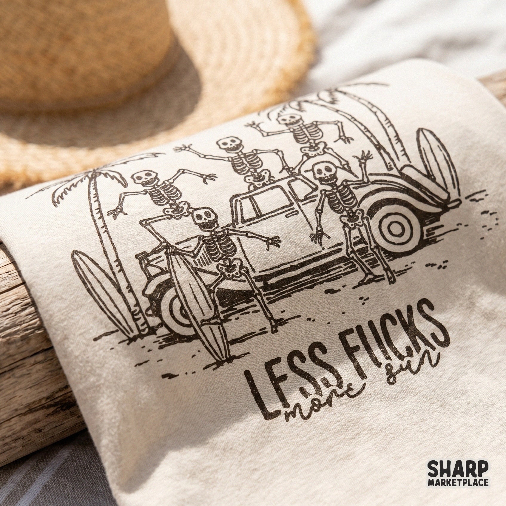 Gritty line art illustration of skeletons enjoying a beach day with surfboards and a car, featuring a red sun and the phrase Less Fucks More Sun.
