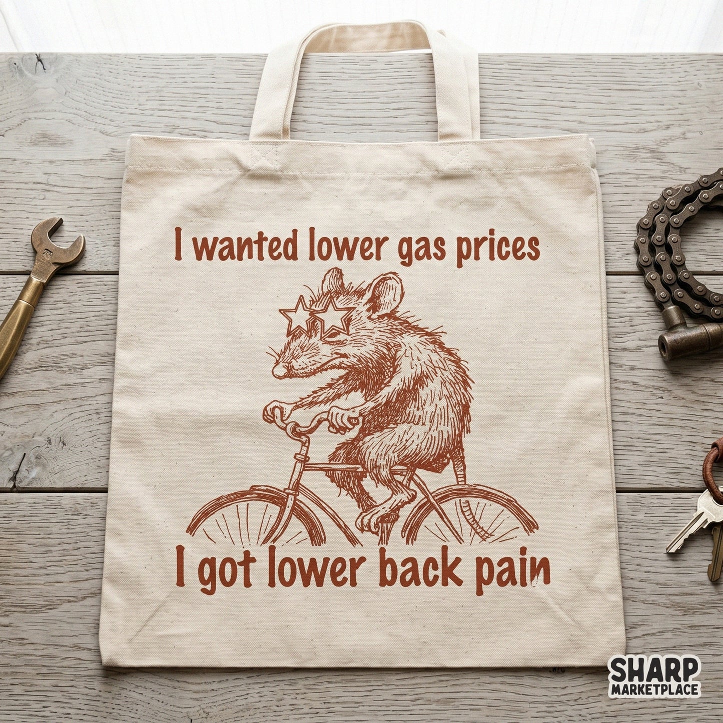 Printable PNG design of a grumpy possum on a bike wearing star-shaped sunglasses perfect for DIY apparel, stickers, and sarcastic gift projects.