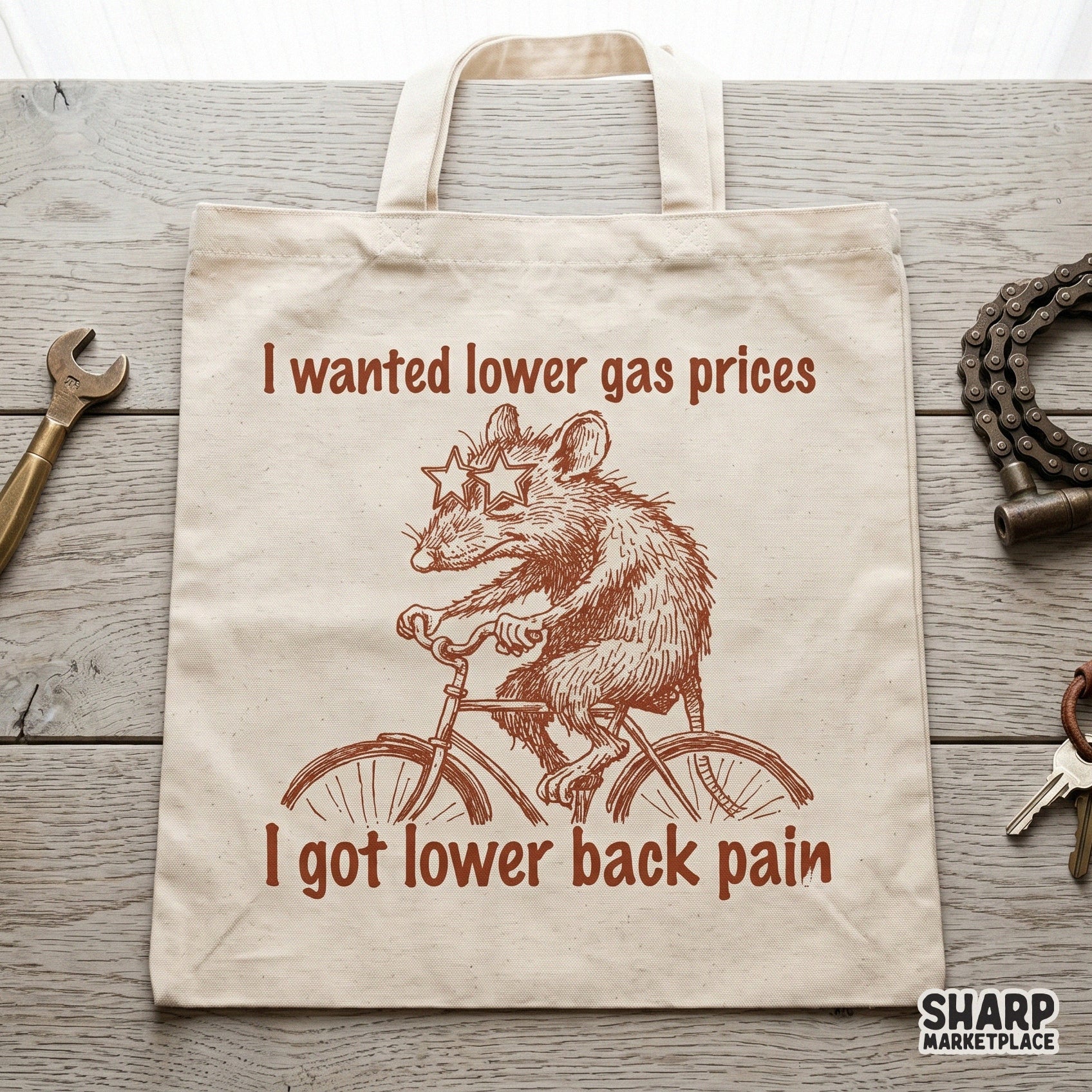 Printable PNG design of a grumpy possum on a bike wearing star-shaped sunglasses perfect for DIY apparel, stickers, and sarcastic gift projects.