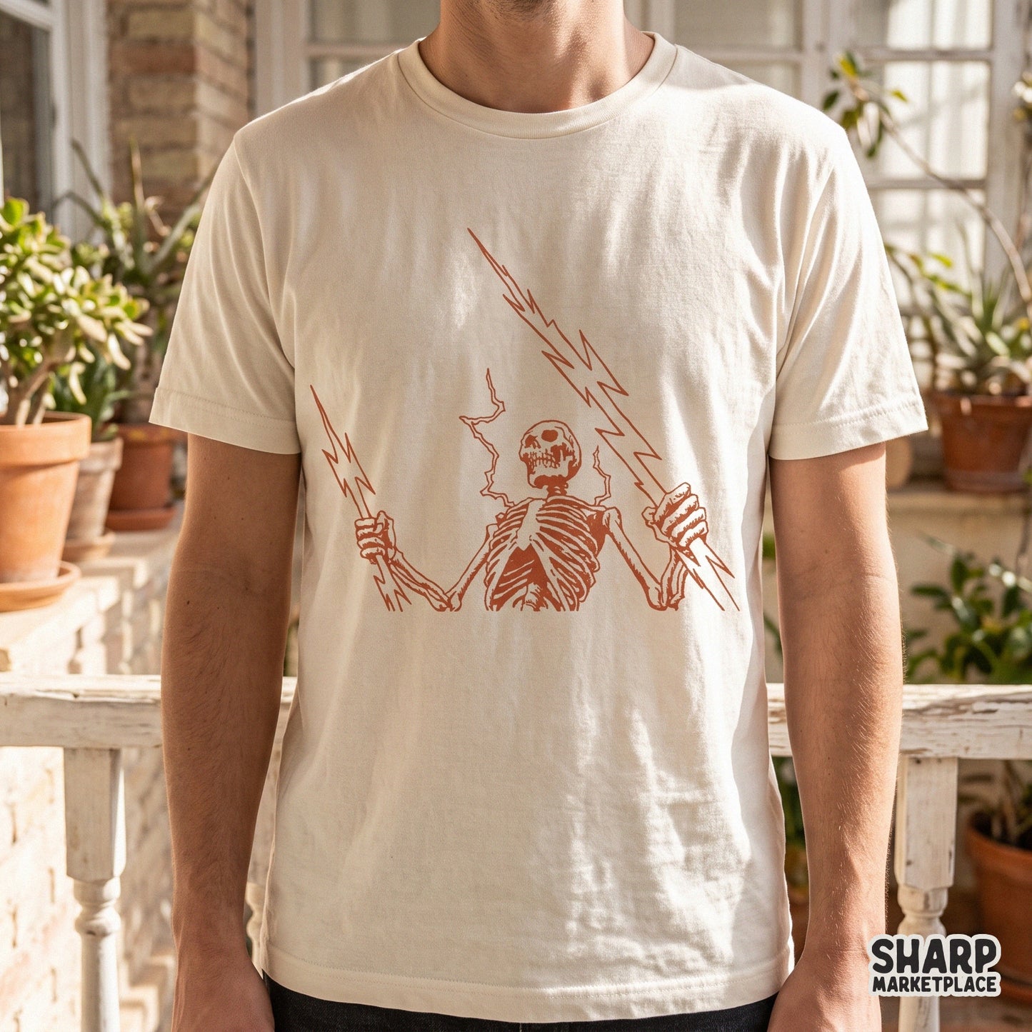 Electric skeleton holding lightning bolts in an edgy goth retro style for spooky season Halloween shirt sublimation designs
