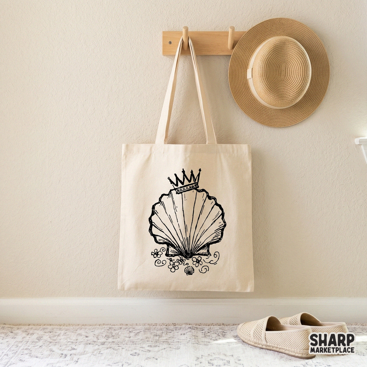 Digital download of a whimsical crowned scallop shell design with floral details, ideal for creating custom beach-themed stickers, shirts, or tumblers.