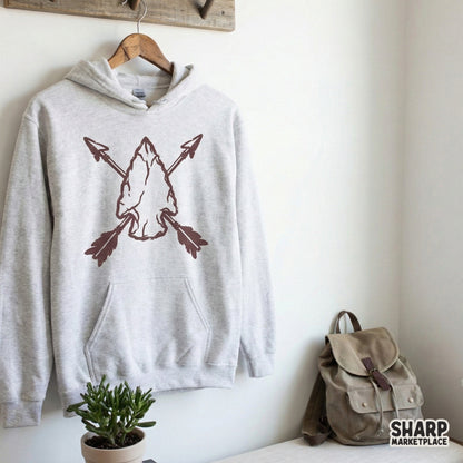 Distressed tribal arrowhead and crossed arrows digital graphic in earthy maroon, ideal for creating custom stickers, tumblers, and rustic wall art prints.