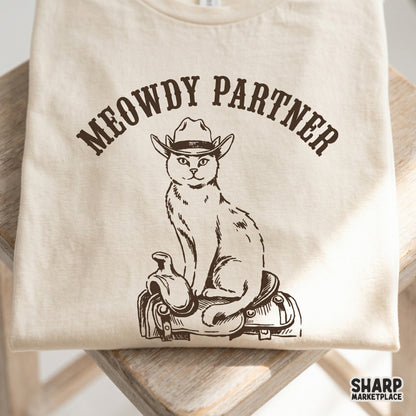 Western rodeo themed digital download featuring a cat in a cowboy hat on a saddle, suitable for sublimation transfers and custom apparel designs.