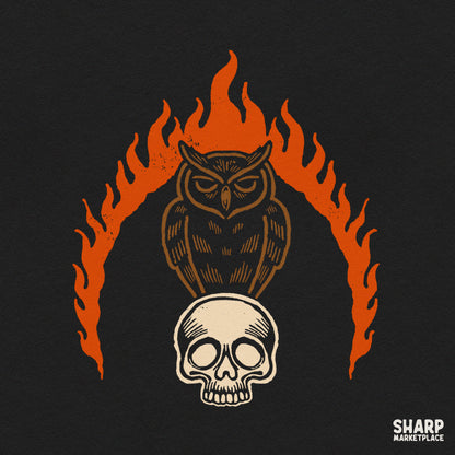 Symmetrical owl on a skull encircled by flames in a dark gothic Halloween PNG sublimation design for shirts