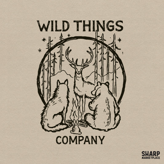 Hand-drawn woodland campfire design featuring a deer, bear, wolf, and rabbit in a forest circle with the text Wild Things Company for apparel printing.