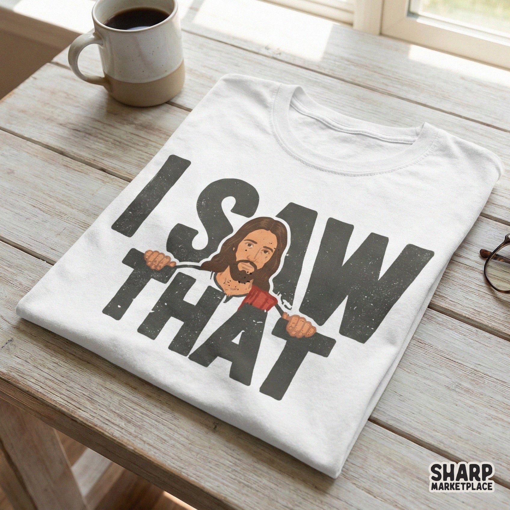 White t-shirt mockup displaying a humorous religious graphic with a man looking over the words I Saw That in a distressed, bold, dark grey font.