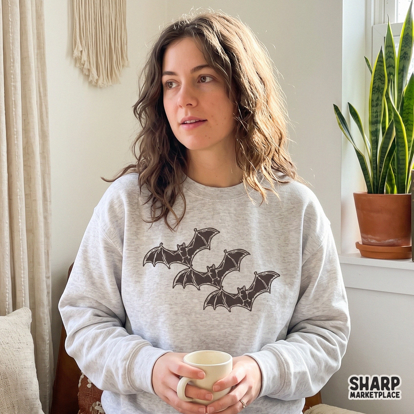 Three flying bats vintage block print illustration for spooky season sublimation shirts and retro halloween decor
