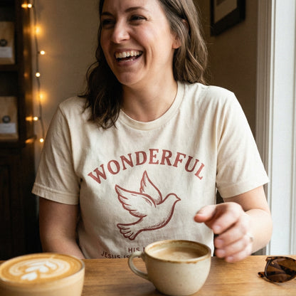 Faith-based digital design in terracotta red with a dove graphic, arched typography, and bible verse text, perfect for custom apparel and DIY projects.