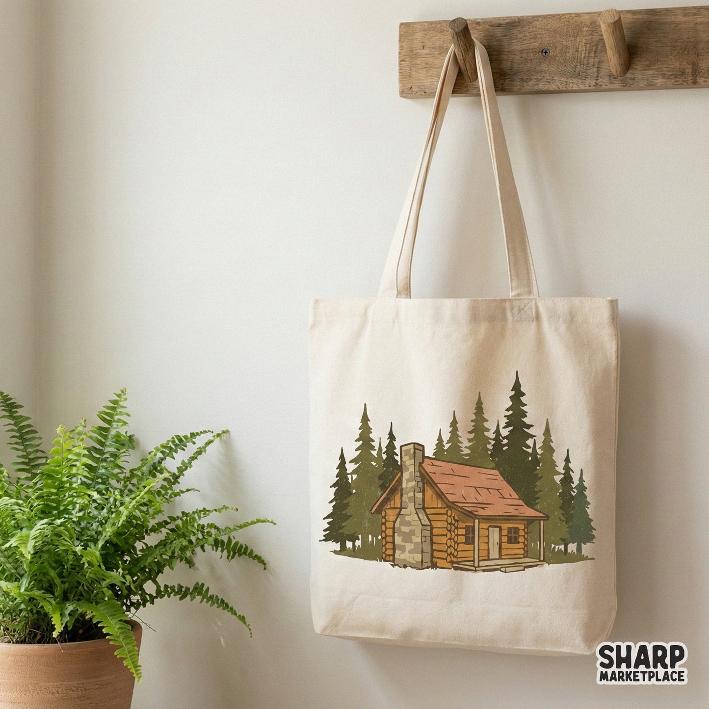 Detailed woodland cabin graphic with a terracotta roof and stone chimney, designed for custom outdoor adventure t-shirts, tumblers, and DIY craft projects.