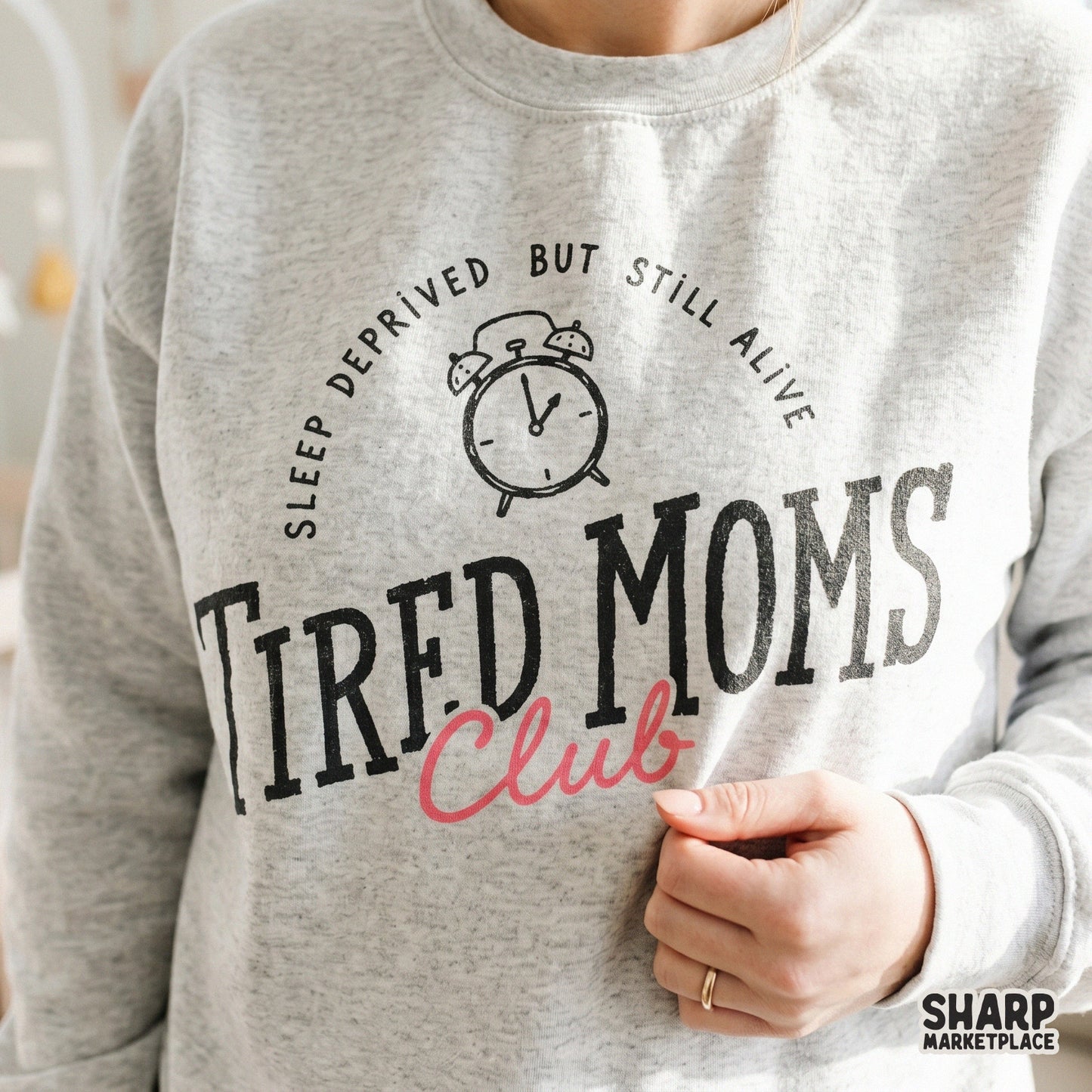 Sarcastic parent humor sublimation file featuring a vintage alarm clock and the text Tired Moms Club for use on tumblers, totes, and clothing.