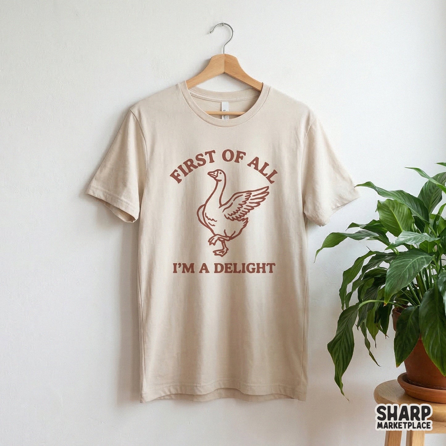 Sassy goose digital design in earthy brown tones with arched text reading First Of All I'm A Delight, perfect for printable wall art or tumblers.