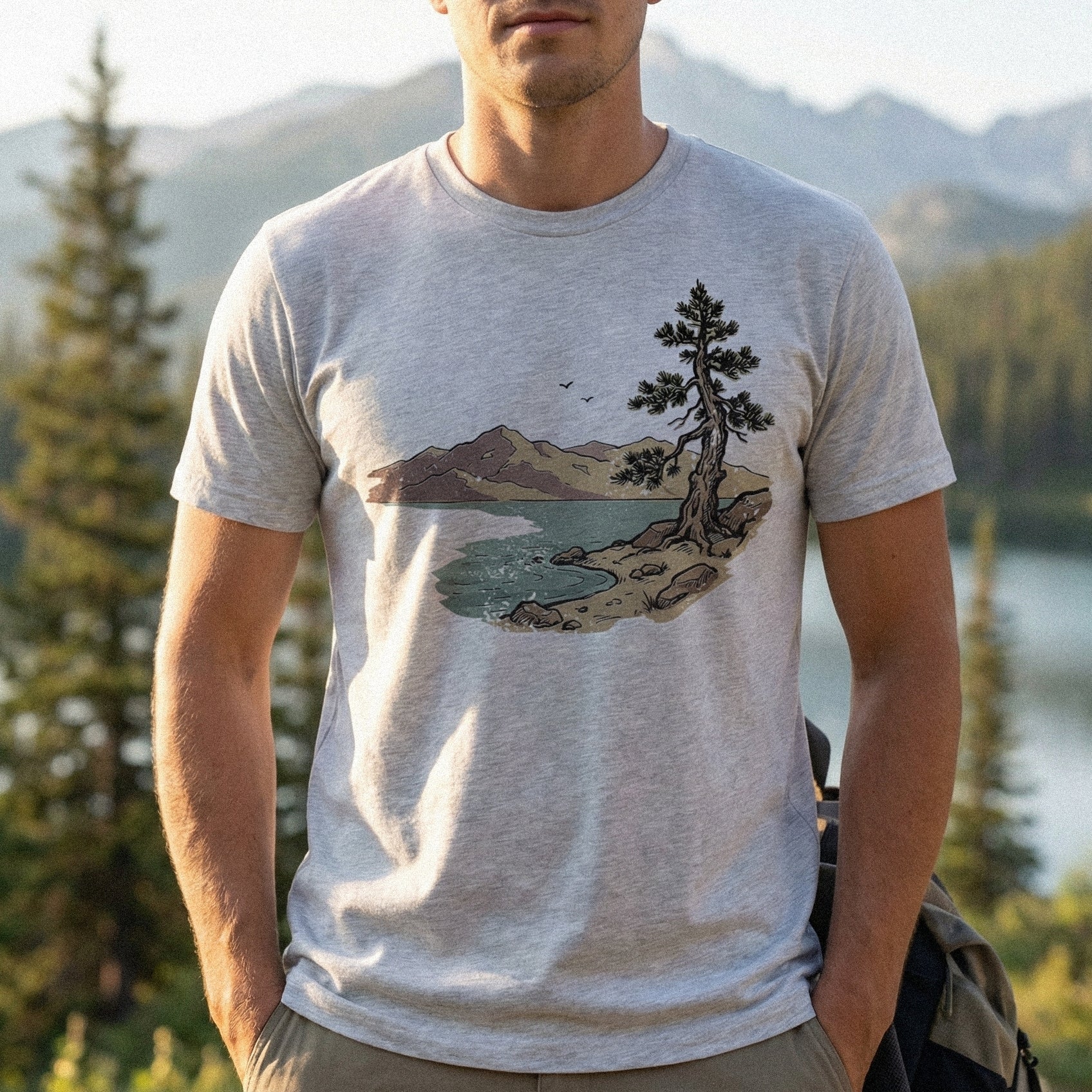 Serene wilderness scene with a pine tree and mountain range, styled as a vintage nature illustration for printing on t-shirts, tumblers, or wall art.