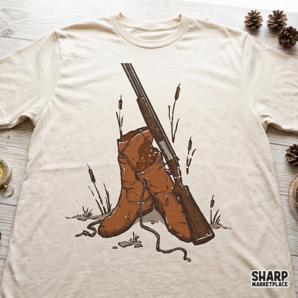 Hand-drawn western hunting illustration of cowboy boots and a rifle printed on a beige t-shirt, perfect for custom apparel and sublimation projects.