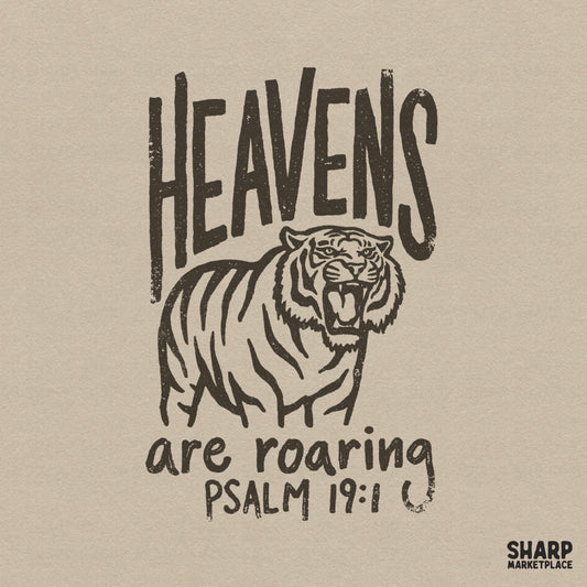 Distressed charcoal tiger illustration with arched text Heavens are roaring and Psalm 19:1, perfect for Christian apparel and sublimation projects.
