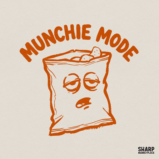 Hand-drawn orange snack bag character with sleepy eyes and a drooping mouth, featuring the text Munchie Mode in a retro, distressed style.