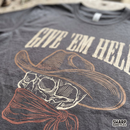 Retro cowboy skull Western PNG graphic featuring a Give 'Em Hell Badlands Outlaw design for edgy t-shirts and apparel