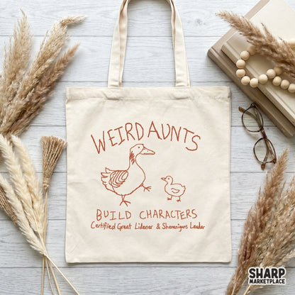 Whimsical orange-toned goose sketch with the text Weird Aunts Build Characters, designed for high-quality sublimation transfers and print projects.