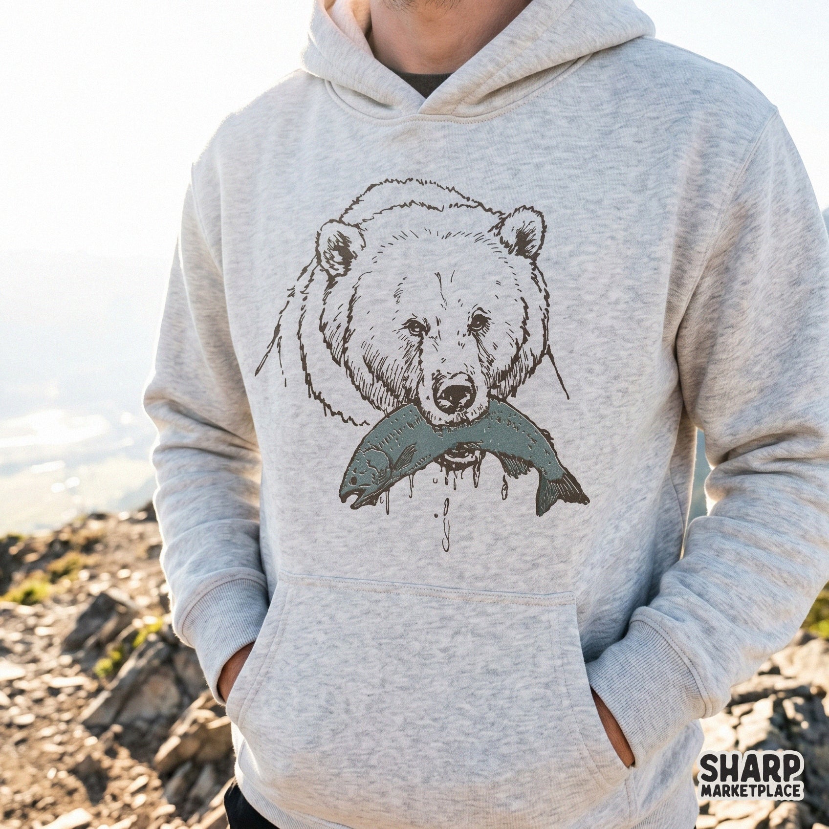 Retro grizzly bear catching salmon wildlife sketch illustration for camping shirt designs