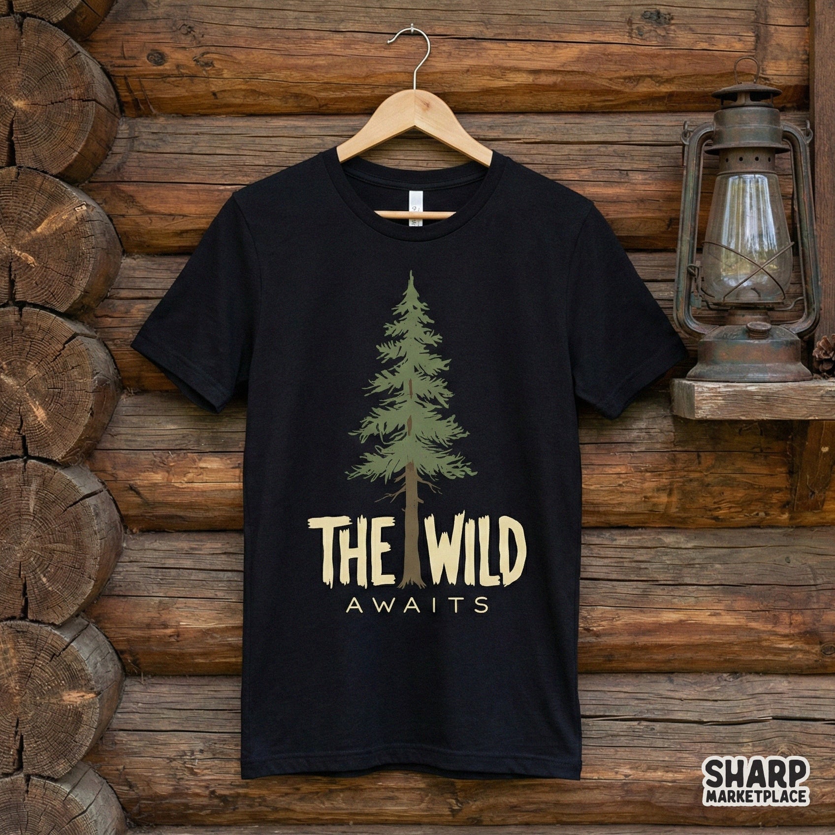 Nature-inspired graphic with a detailed evergreen tree and rustic lettering, suitable for custom camping shirts, stickers, and wilderness wall art.