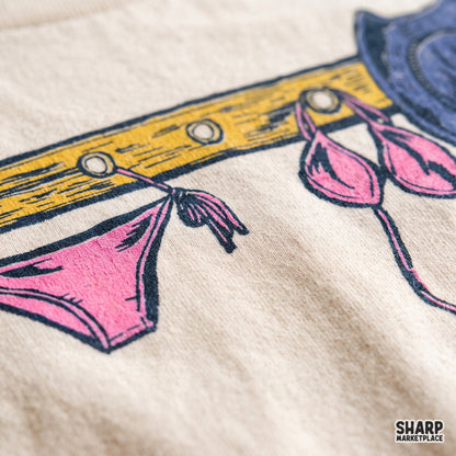 Vintage coastal cowgirl bikini on wall rack summer PNG design for retro western beach shirts and sublimation tees
