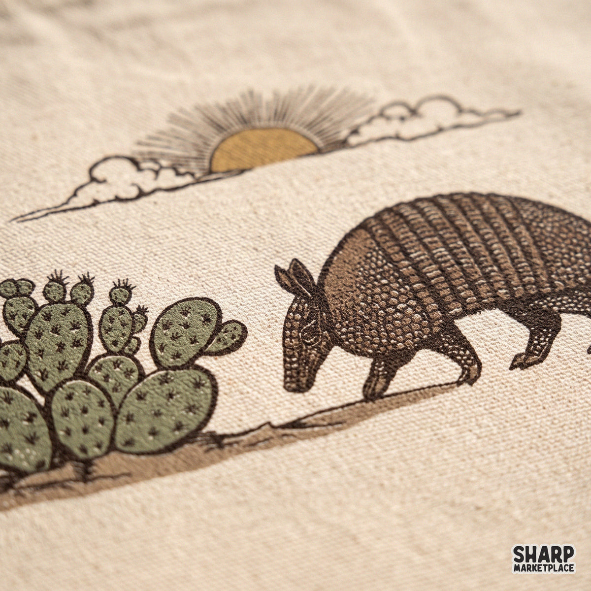 Vintage armadillo walking by a prickly pear cactus desert scene western PNG sublimation design for shirt print
