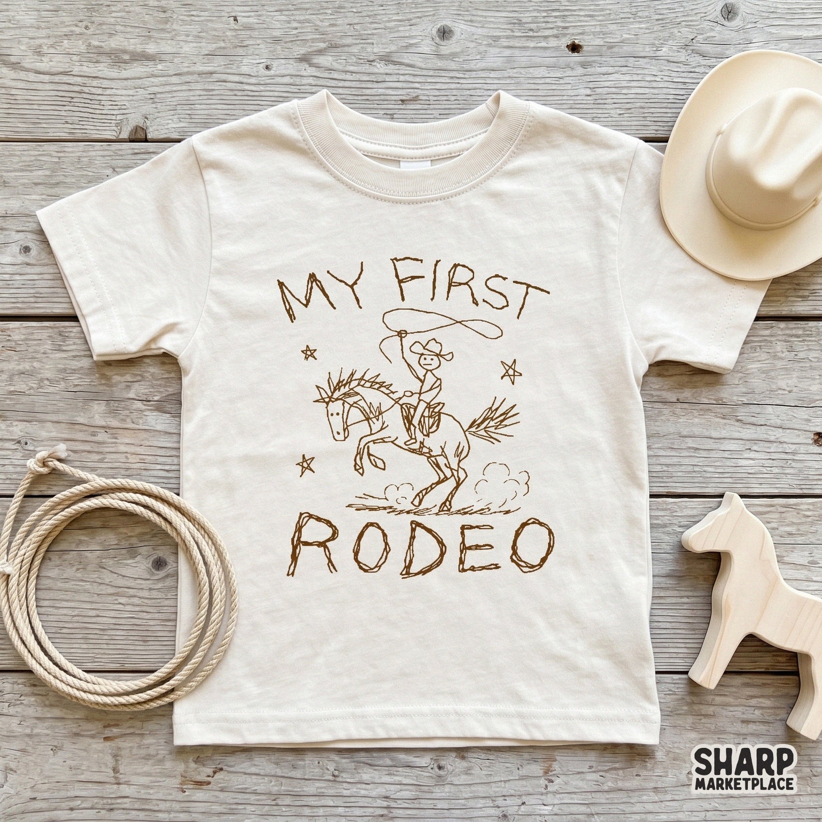 Digital western illustration of a cowboy riding a horse with lasso and stars, featuring textured typography for DIY cowgirl shirts and crafts.