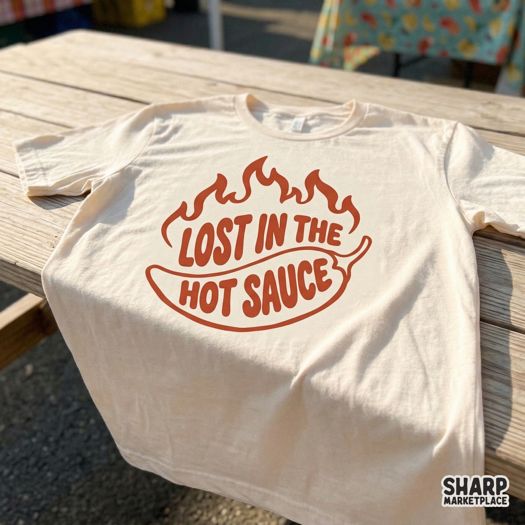 Trendy digital download featuring a fiery chili pepper and the phrase Lost In The Hot Sauce, ideal for DTF printing and apparel projects.