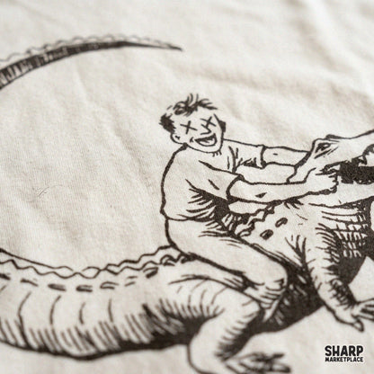 Funny vintage drawing of a boy riding an alligator in a swamp scene PNG for t-shirts and summer apparel