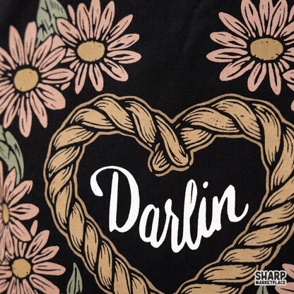 Darlin western PNG design featuring a rope heart border with pink daisies for country cowgirl t-shirts