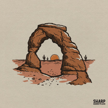 Hand-drawn desert rock arch framing a sunset with saguaro cacti, featuring a rustic terracotta and tan color palette for western-themed DIY projects.