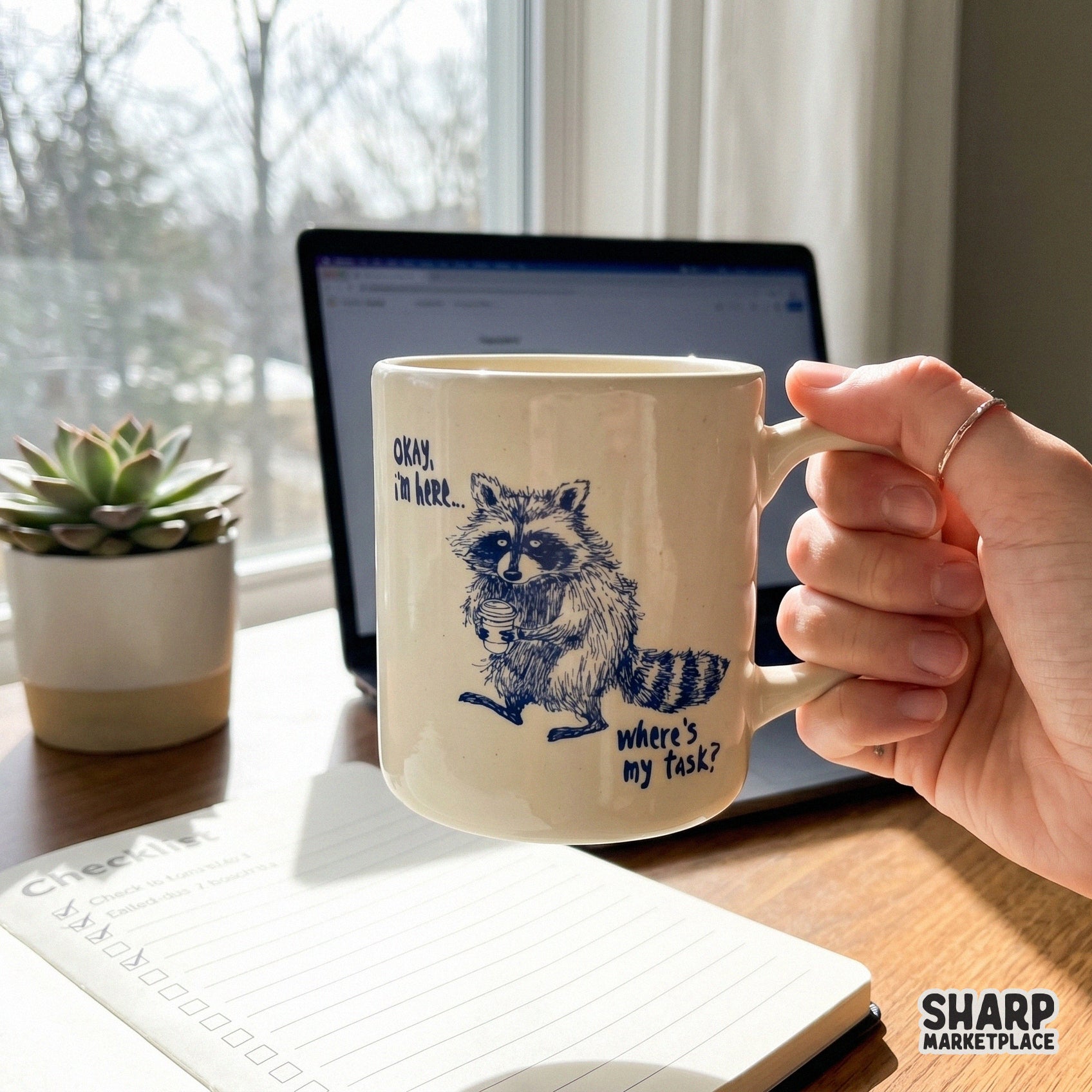 Digital sublimation design of a cute trash panda holding a coffee mug, perfect for printing on office-themed apparel, mugs, or custom stickers.