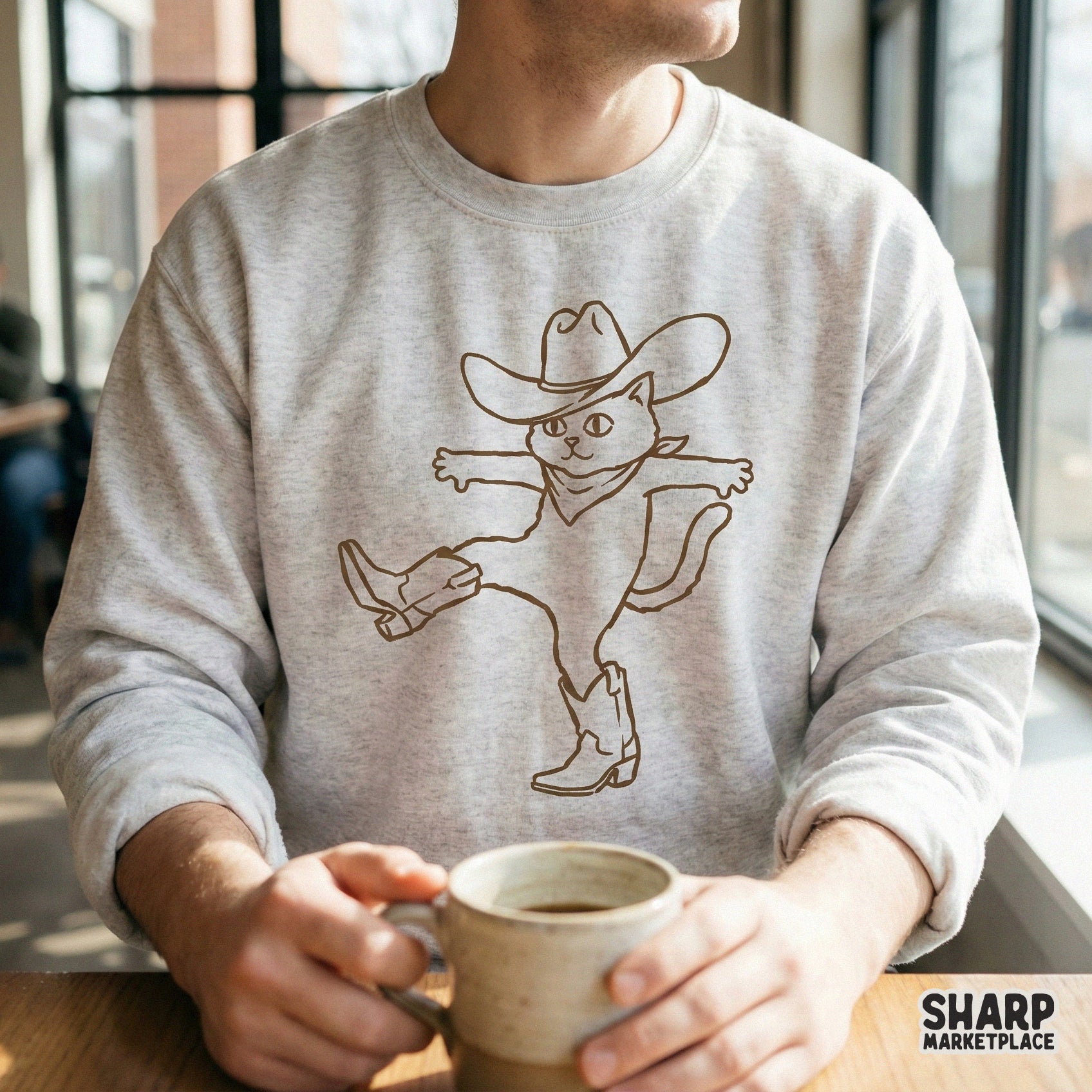Hand-drawn western cat graphic in a simple brown line art style, ideal for DIY apparel, tumblers, and creative projects with a country aesthetic.