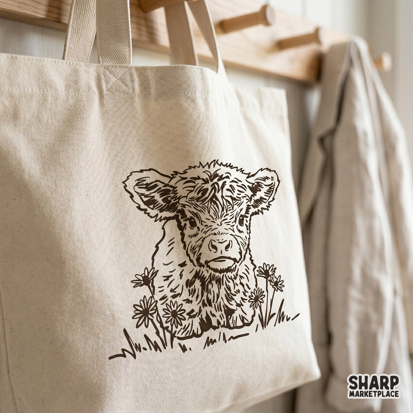 Detailed line art of a sweet highland calf in a field of flowers, designed as a transparent PNG for custom apparel and farmhouse wall art.
