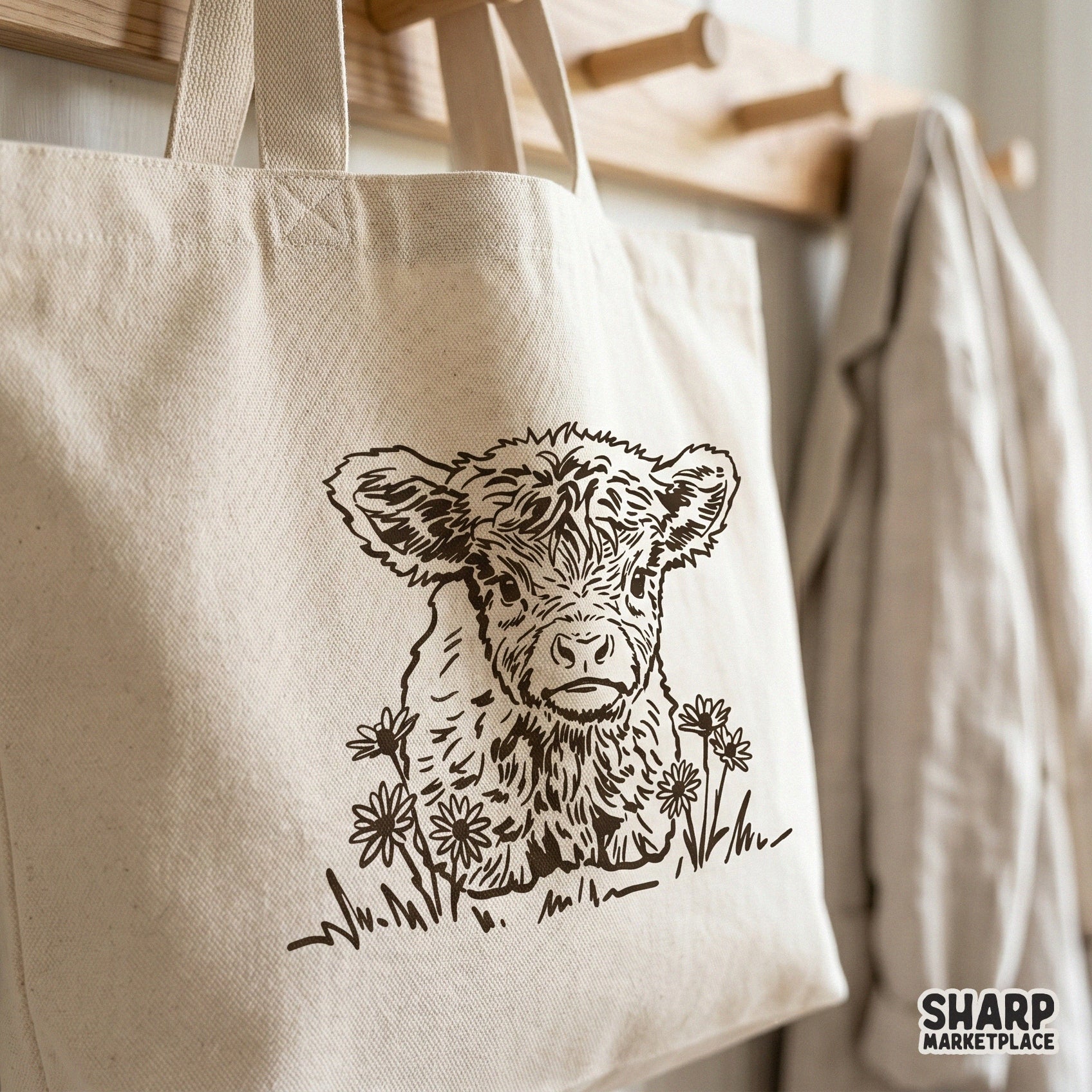 Detailed line art of a sweet highland calf in a field of flowers, designed as a transparent PNG for custom apparel and farmhouse wall art.