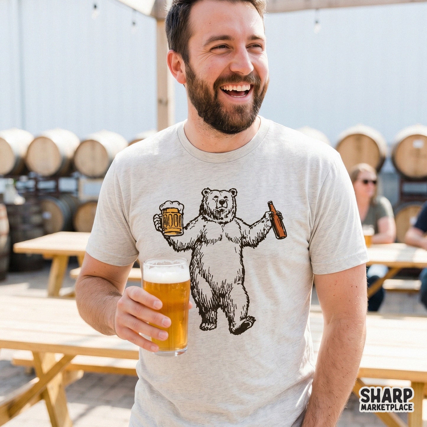 A lifestyle mockup showing a dancing polar bear design with a beer mug and bottle on a light-colored t-shirt, ideal for Father's Day gifts.