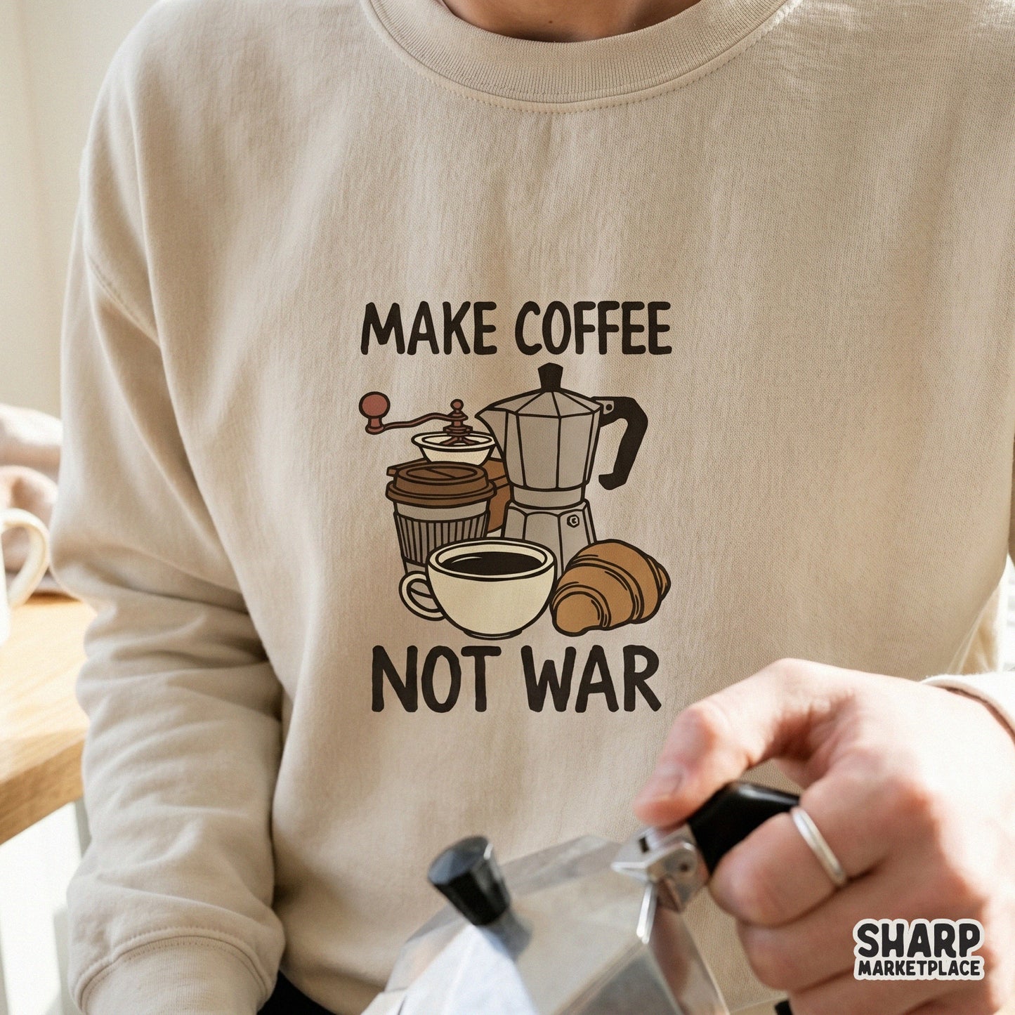 Printable cafe-themed artwork with a steaming mug and pastry illustration, perfect for coffee shop decor or trendy DIY t-shirt projects.