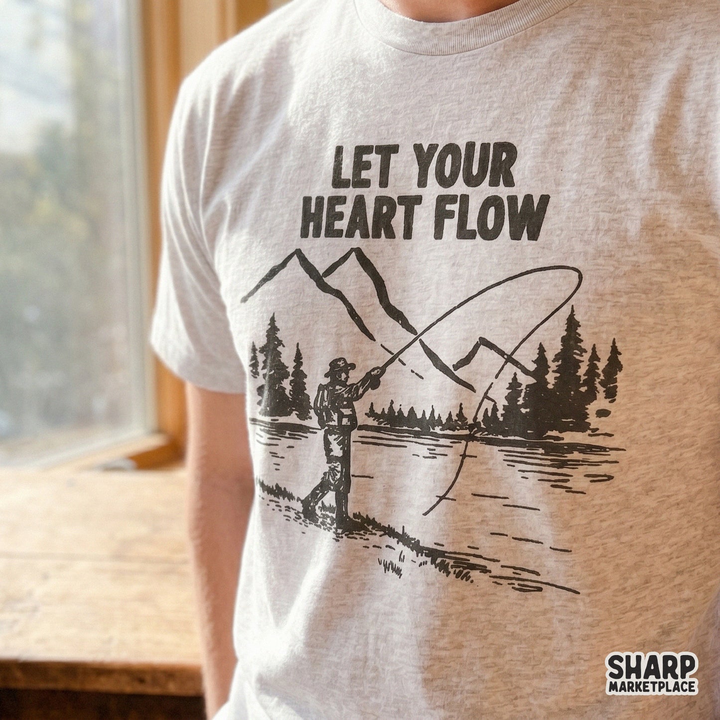 Hand-drawn style fishing illustration featuring a peaceful lake scene and the quote Let Your Heart Flow, suitable for sublimation printing.