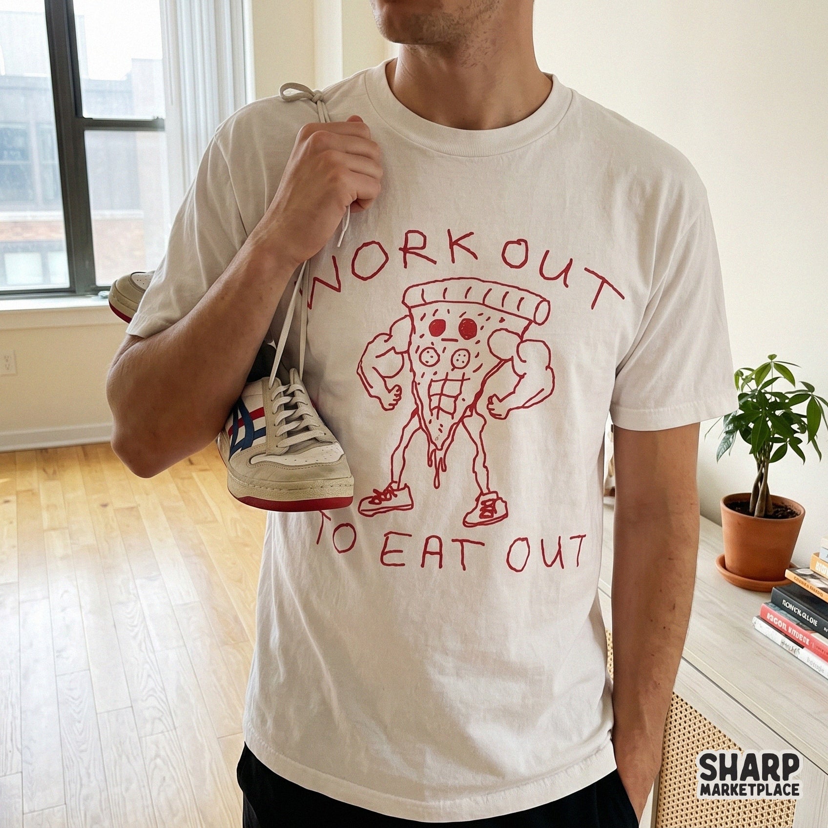 Trendy red crayon-style graphic of a flexing pizza slice character with the funny fitness pun Workout To Eat Out for custom gym t-shirts and stickers.