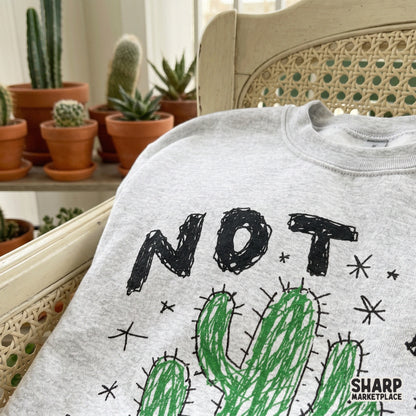 Digital download of a moody cactus graphic with the phrase Not A Hugger, ideal for sublimation printing on tumblers, apparel, or DIY craft projects.
